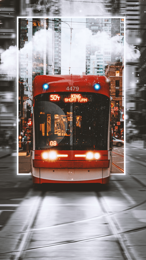 Poster artwork of a red Toronto streetcar photographed head-on in falling snow